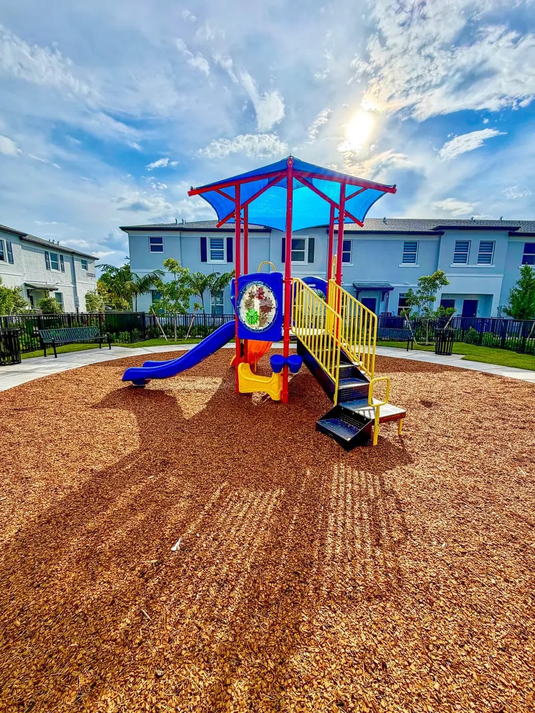 Solstice play system on engineered wood fiber at sunset