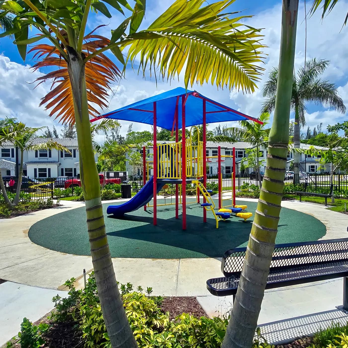 Le Jardine shaded play area seen from the walkway