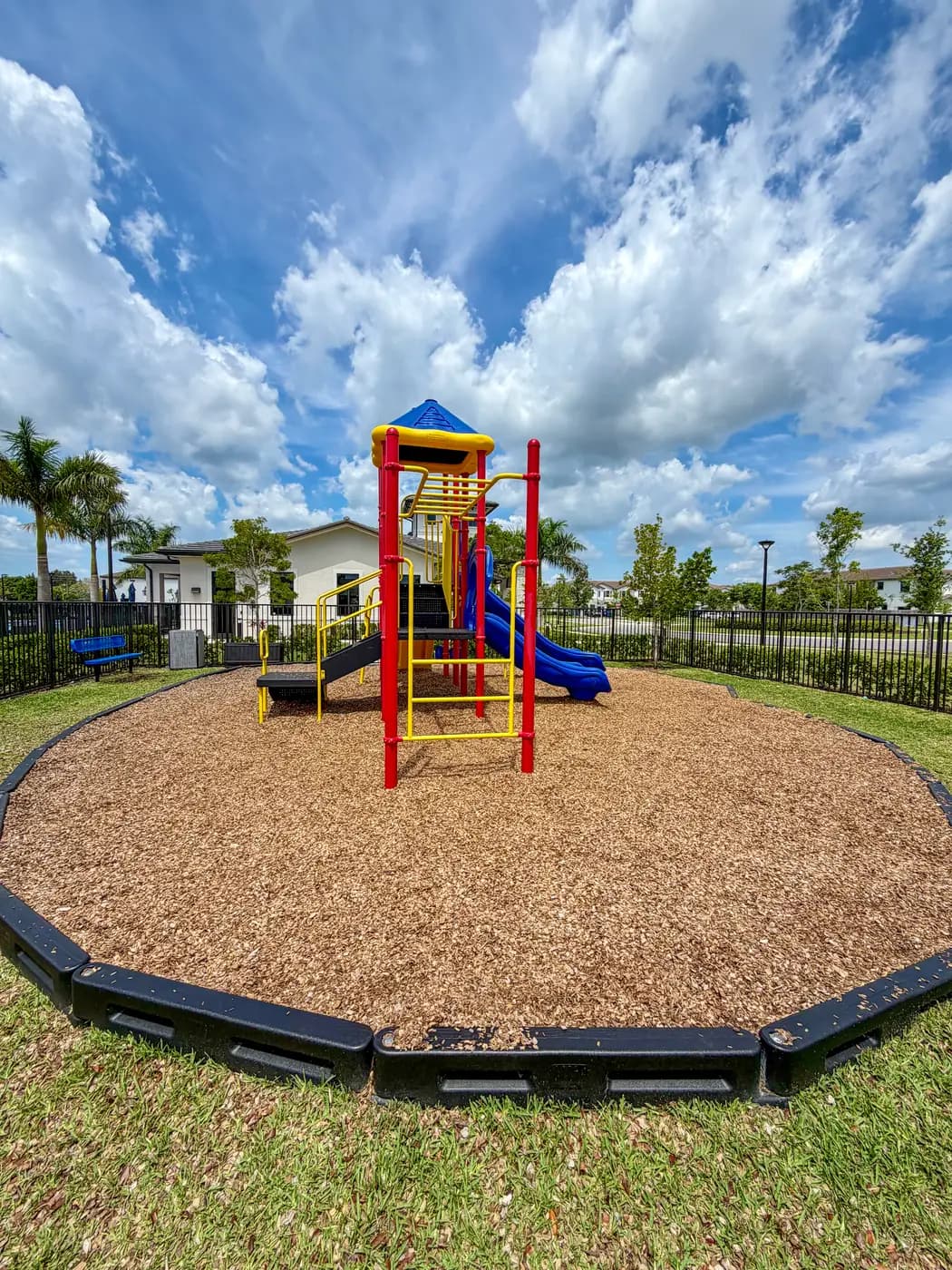 Swing set at the Siena Reserve community park